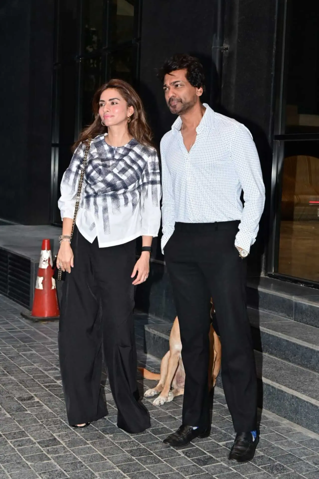 Nikhil Dwivedi arrived at the screening with his wife, making a stylish appearance together. The couple kept their look elegant and understated.